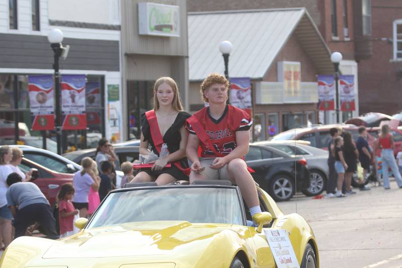Hall homecoming king candidate Gabe Wamhoff and queen candidate Emma McCook ride during the Homecoming parade on Thursday, Sept. 18, 2025 downtown Spring Valley.