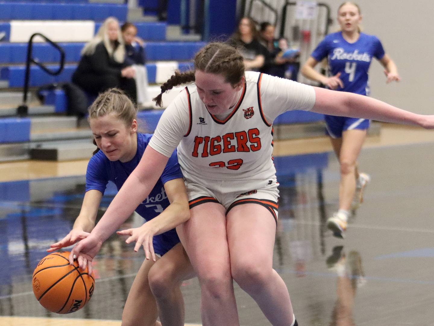 Burlington Central’s Julia Scheuer, left, races Crystal Lake Central’s Leah Spychala for the ball in IHSA Class 3A Regional Title Game girls basketball action on Thursday, Feb. 20, 2025, at  Central High School in Burlington.