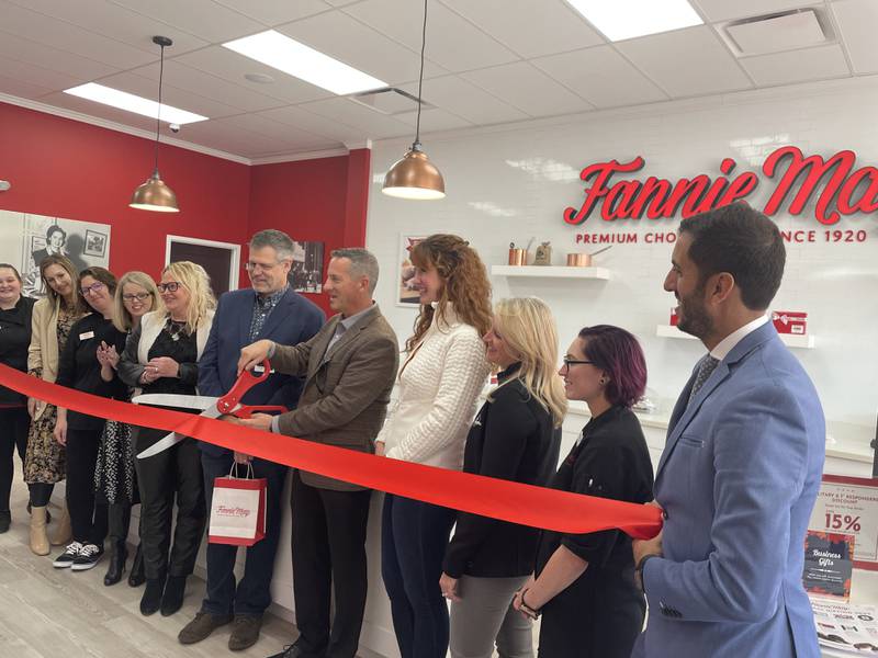 A ribbon cutting is seen Oct. 28, 2022 at Fannie May's new store, located at 2215 Sycamore Road in DeKalb.