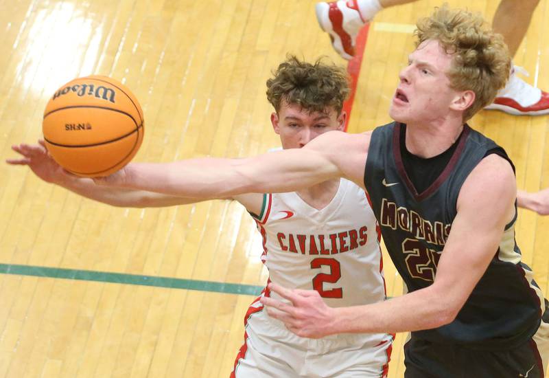 Morris's RJ Kennedy eyes the hoop as L-P's Regan Doerr defends on Monday, Feb. 9, 2026 in Sellett Gymnasium at L-P High School.