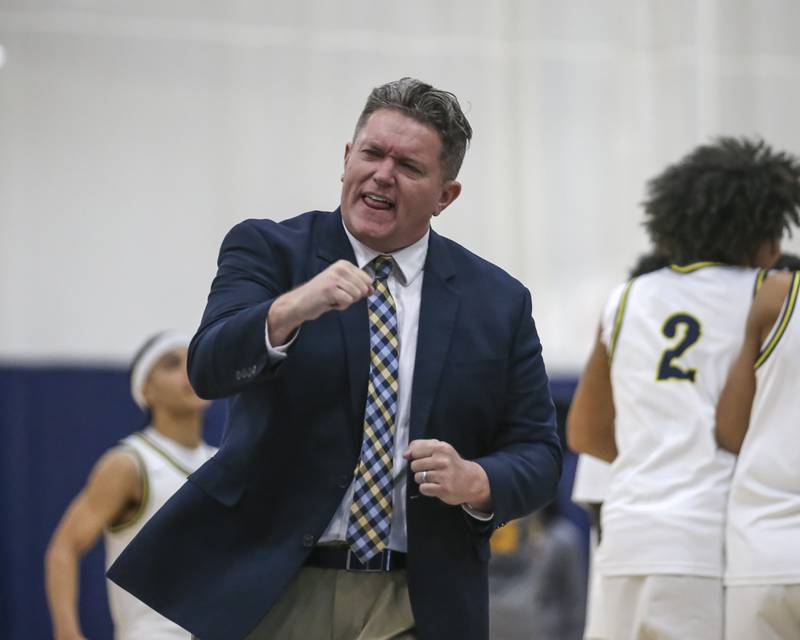 Yorkville Christian's head coach Aaron Sovern celebrates the win over Christ the King, Feb 6, 2026 in Yorkville.