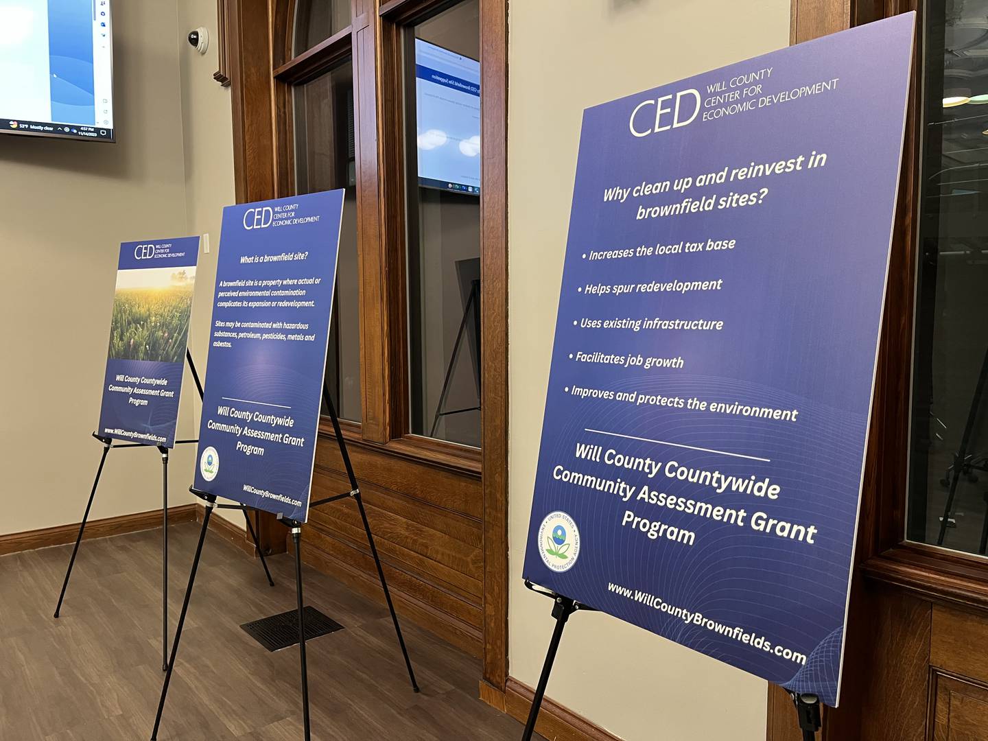 Display panels with information about the Will County Center For Economic Development's outreach efforts regarding brownfields seen on Tuesday, Nov. 14, at the Joliet Public Library's Ottawa Street branch.