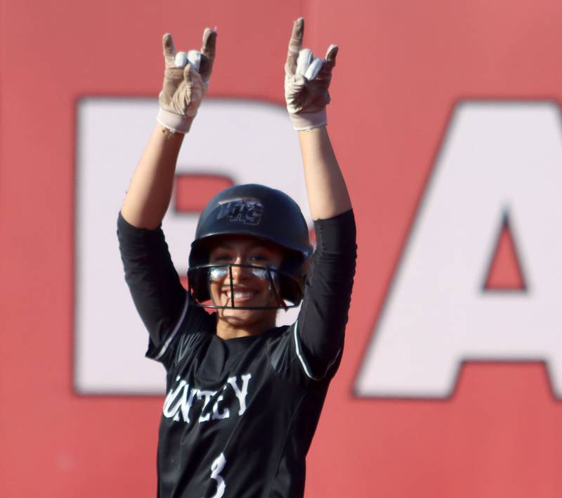 Huntley’s Alyssa Bonner celebrates arriving at second base with a double against Barrington in IHSA Class 4A Sectional Title Game softball action at the Fields of Dreams on the campus of Barrington High School in Barrington on Friday, June 6, 2025.