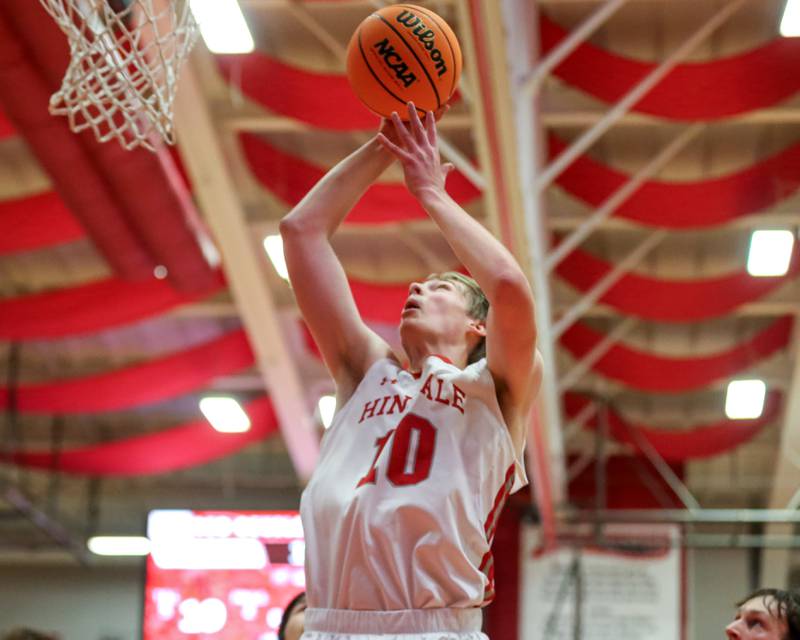 Hinsdale Central's Tyler Thick (10) puts in a shot during their basketball game between Glenbard West at Hinsdale Central, Friday  Dec 6, 2024  in Hinsdale.