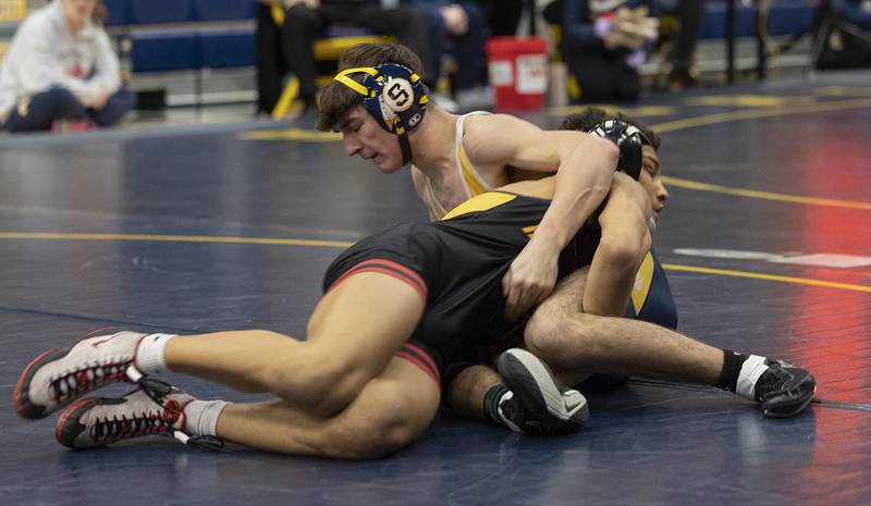 Sterling’s Jonah’s Tyne and Rock Island’s Antonio Parker face off in a 144 pound match Friday, Jan. 31, 2025, during the Western Big 6 conference wrestling tournament held at Sterling High School.