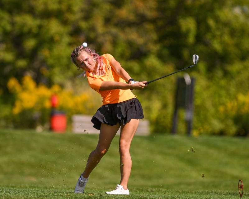 Mia Martin St. Charles East tees off during the DuKane conference meet on Tuesday Sept. 23, 2025, held at Phillips golf course in Aurora.