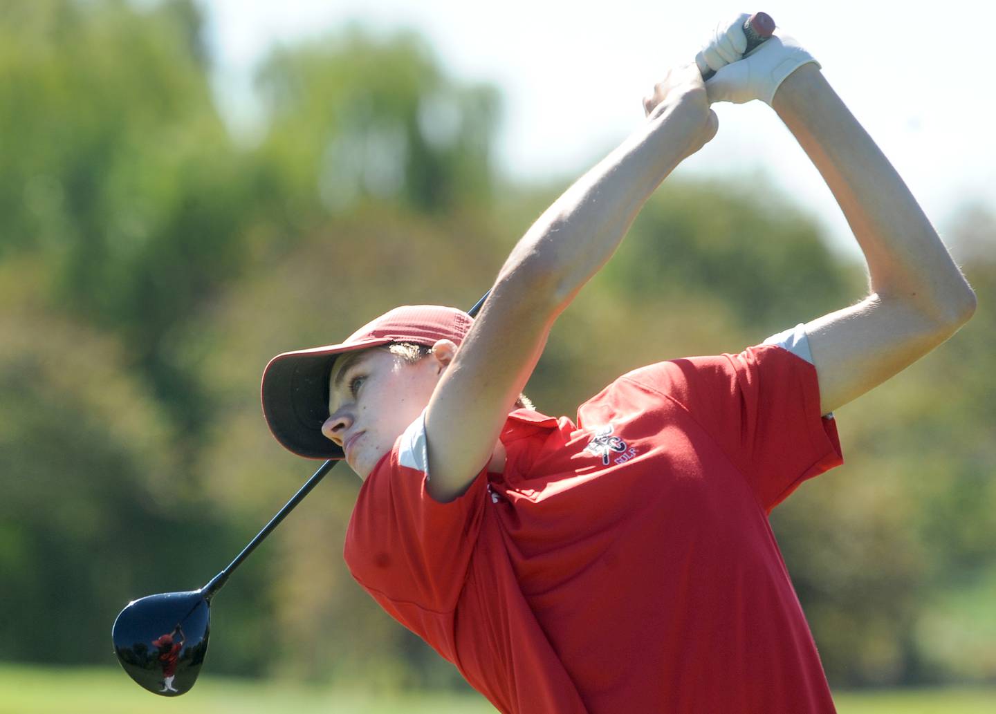 Hinsdale Central's Emil Riegger watches his tee off on the 7th hole during the Class 3A Oswego Boys Golf Sectional at Blackberry Oaks Golf Course in Bristol on Monday, Oct. 3, 2022.