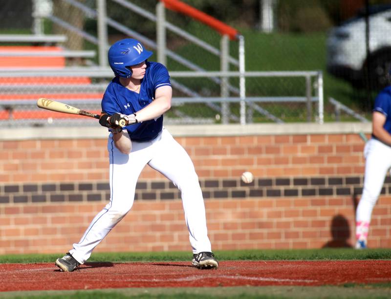 Wheaton North's Alex Popham makes contact during a game against St. Charles East on Wednesday, April 23, 2025 in St. Charles.