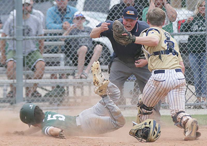 St. Bede's Colin Nave (5) is tagged out by Marquette's Hayden McKenna at home plate in the Class 1A regional semifinal game on Wednesday, May 18, 2022, in Ottawa.