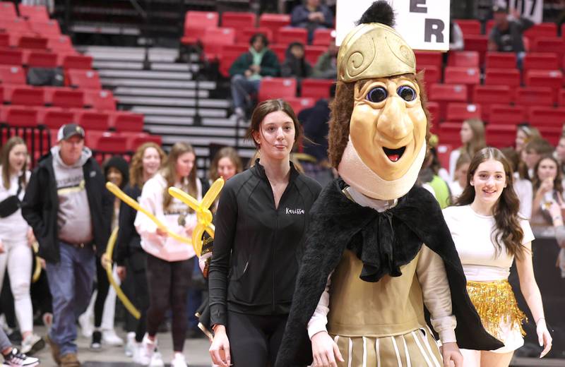 Sycamore students participate in the parade of athletes between games at the First National Challenge Friday, Jan. 27, 2023, at The Convocation Center on the campus of Northern Illinois University in DeKalb.