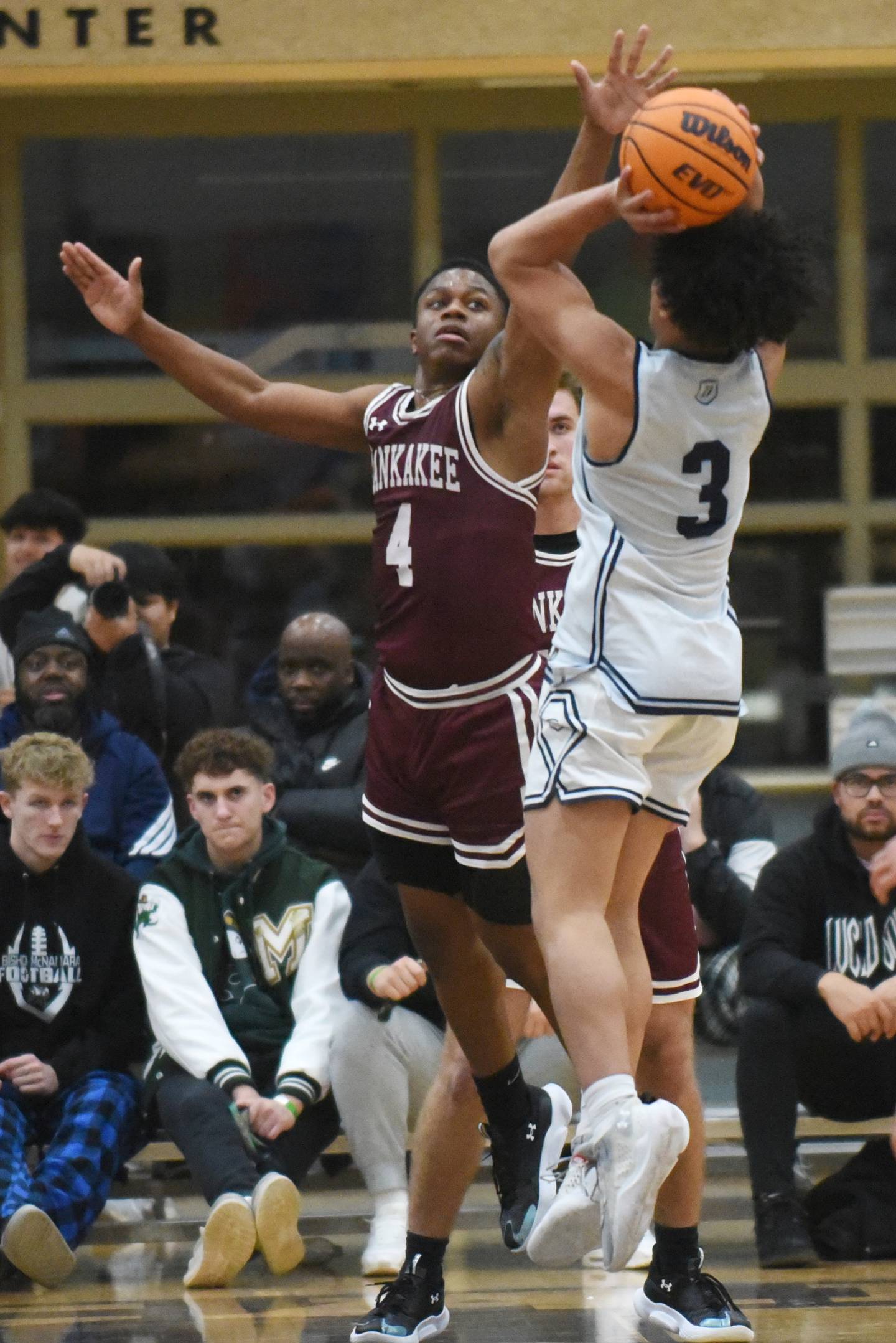 Kankakee's Myair Thompson (4) defends a shot from DePaul Prep's AJ Chambers during a game at the Team Rose Shootout at Mount Carmel Sunday, Dec. 14, 2025.