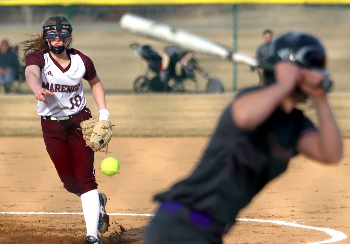 Marengo’s Lilly Kunzer delivers during a win over Belvidere in varsity softball at Marengo on Monday.