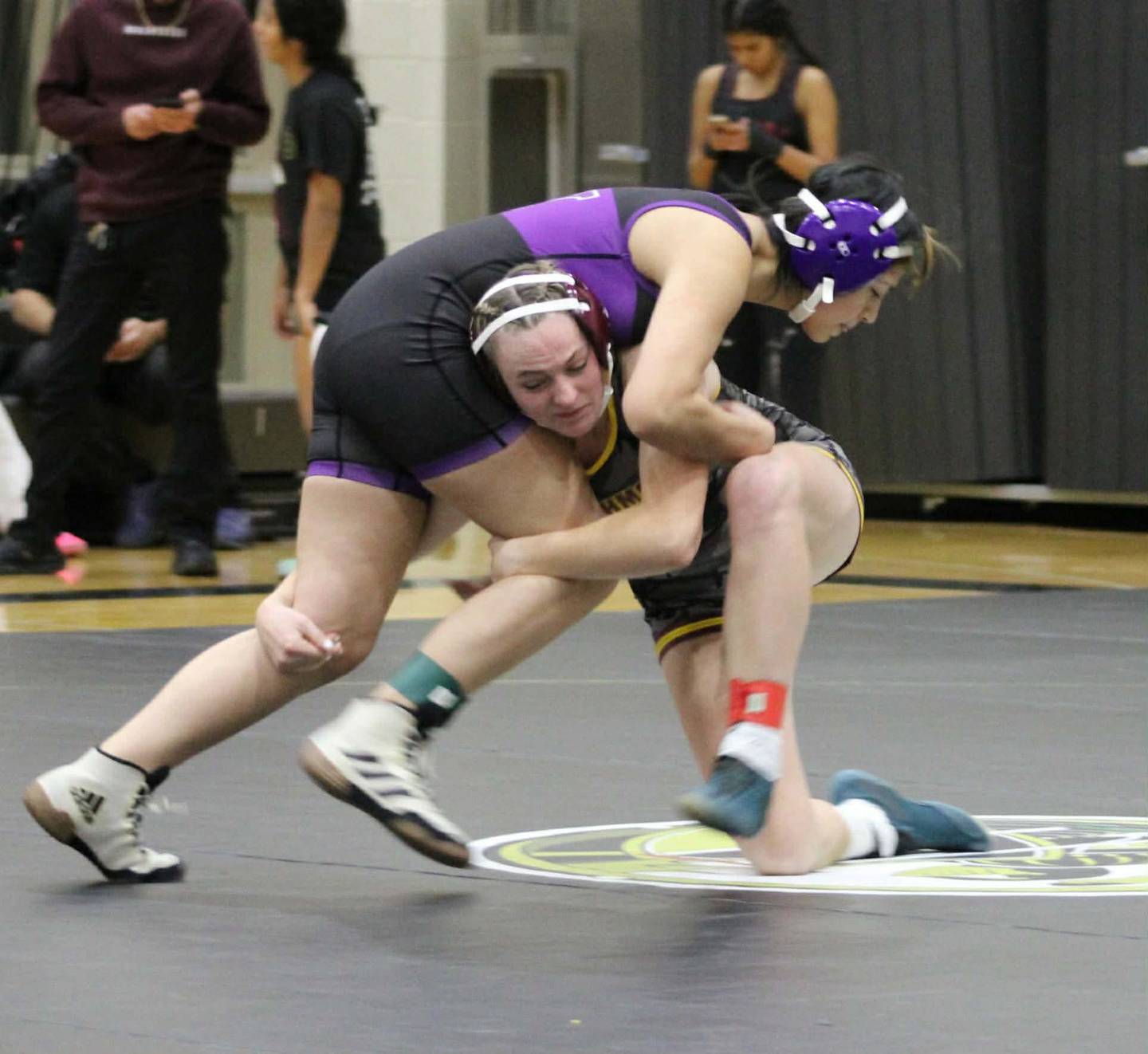 Richmond-Burton's Madelyn Peterie gets into a takedown position during varsity action earlier this season.