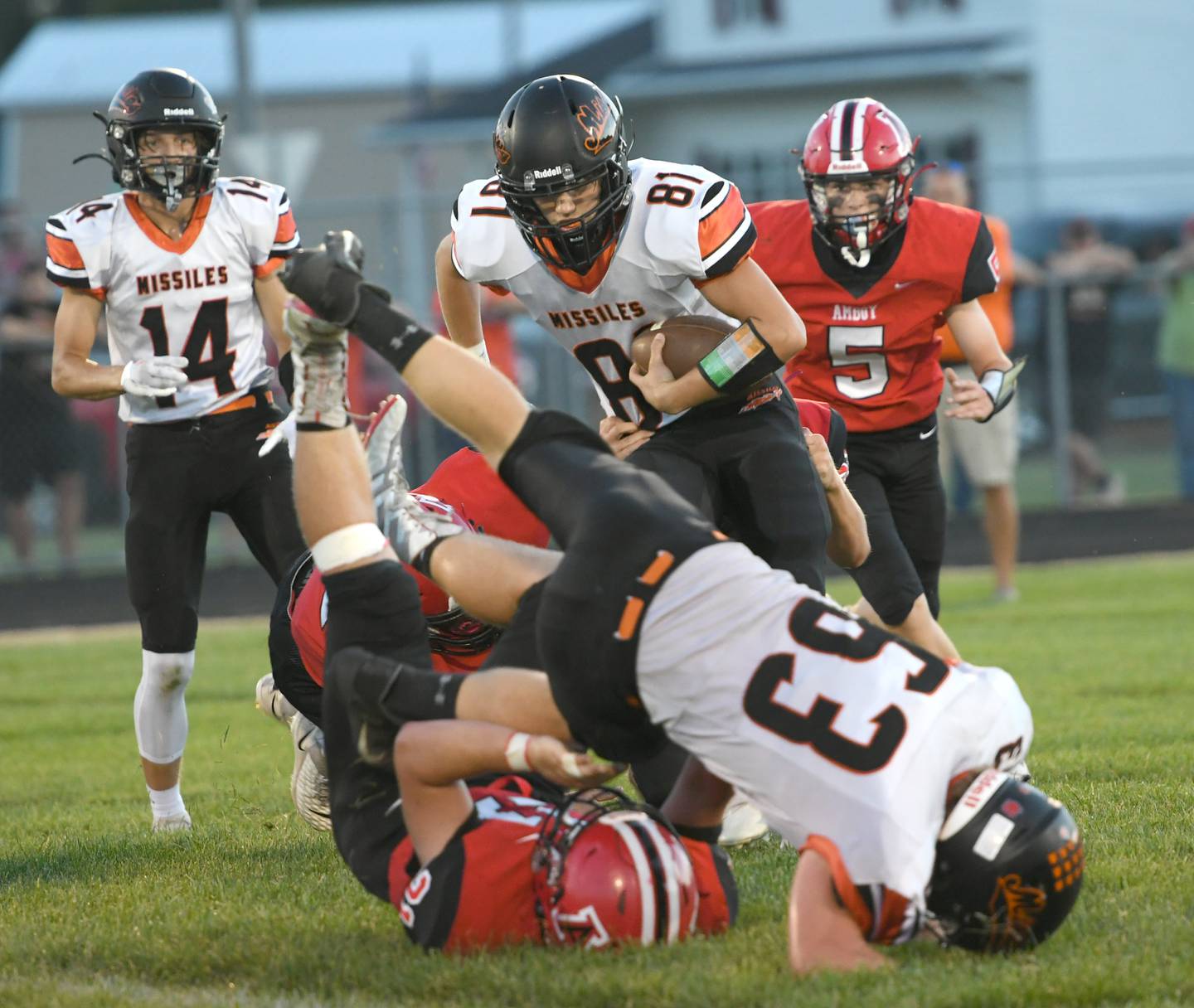 Milledgville's Konnor Johnson runs with the ball as Eric Ebersole (63) blocks against Amboy on Friday. Sept. 9.