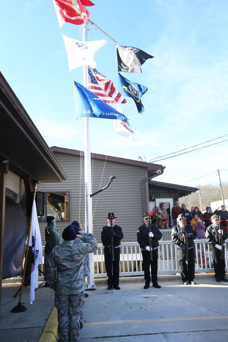 Civil Air Patrol Illinois Valley Cadet Squadron raises the American Flag during the annual Pearl Harbor parade and memorial service on Saturday in Peru. This year marks the 83rd anniversary of the Dec. 7, 1941, attack on Pearl Harbor.