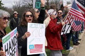 Photos: Hundreds of protesters voice discontent with Trump administration during 'No Kings' march