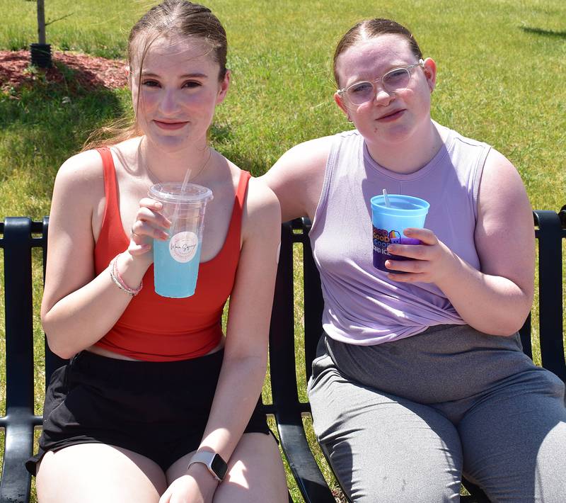 Madline Malooley (left), of Morrison and Audrey Crisp of Sterling cool off while visiting Rock Falls Chamber of Commerce’s Summer Splash Saturday June 21st, 2025, at RB&W Park.