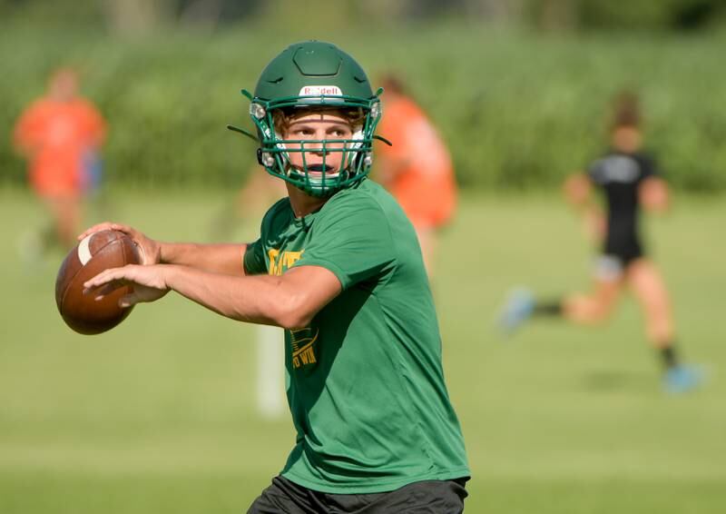 Crystal Lake South's Caden Casimino passes against Kaneland during a 7 on 7 football in Maple Park on Tuesday, July 12, 2022.