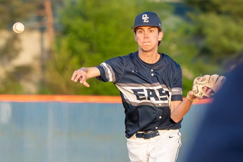 Oswego’s Cade Duffin (23) fields a grounder and throws to first for an out against Oswego during a baseball game at Oswego High School on Tuesday, May 9, 2023.