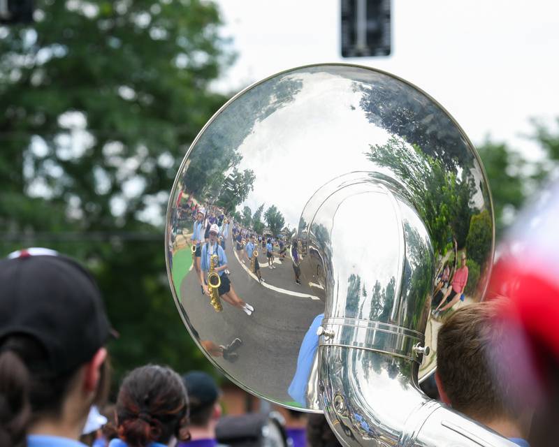 Downers Grove North and Downers Grove South marching band join together during the Independence Day parade on Friday July 4, 2025, held in downtown Downers Grove.