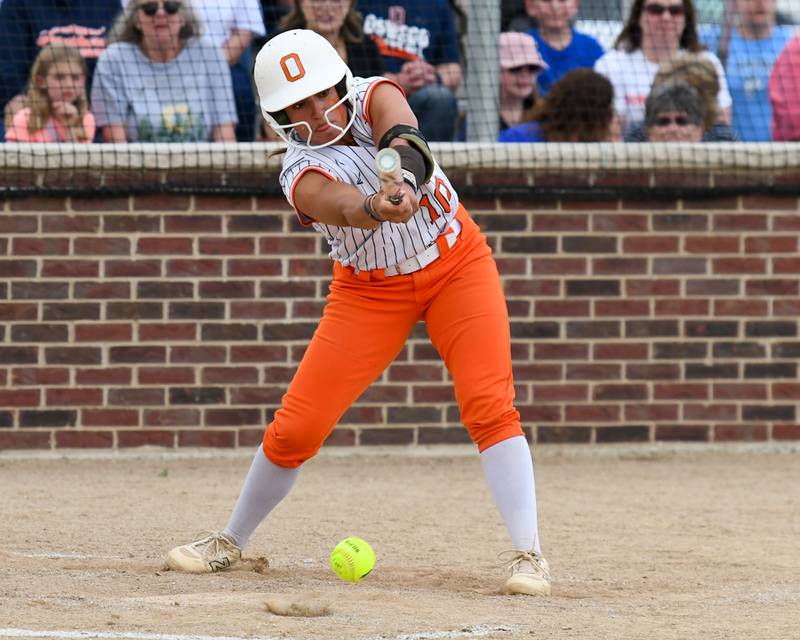 Oswego's Kiyah Chavez (10) makes contact with the ball during the sectional semifinals game on Tuesday June 3, 2025, while taking on Yorkville held at Oswego High School.