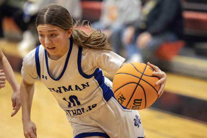 Newman’s Elaina Allen handles the ball against Eastland Tuesday, Feb. 18, 2025, during the Class 1A girls basketball regional at Forreston.