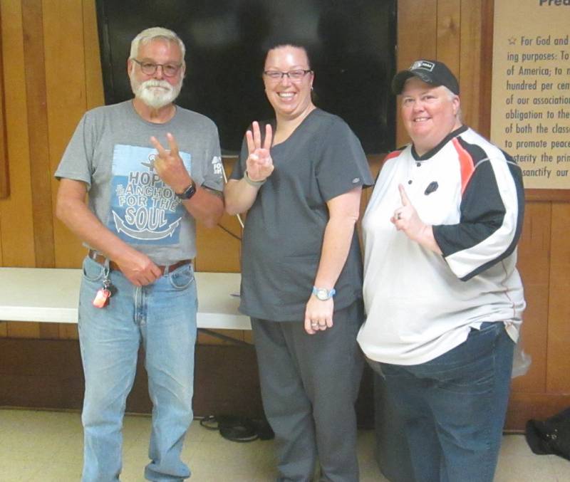 Pictured are Open Roads ABATE of IL, Inc. cash prize winners, from left, Michael Guiliano (2nd place), Nickie Warmac (3rd place) and Tracey Supan (1st place).