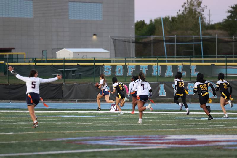 Oswego's Leona Bateman breaks away for a touchdown during the Panthers' 13-7 victory over Joliet West on Tuesday, Oct. 7, 2025.