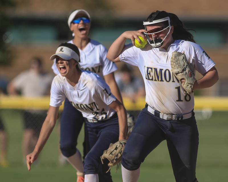 Lemont's Allison Pawlowicz (25) and Natalie Pacyga (18) run off the field to celebrate the victory over Marian Catholic with their teammates for winning the Class 3A Joliet Catholic Sectional final game over Marian Catholic.  June 3, 2022