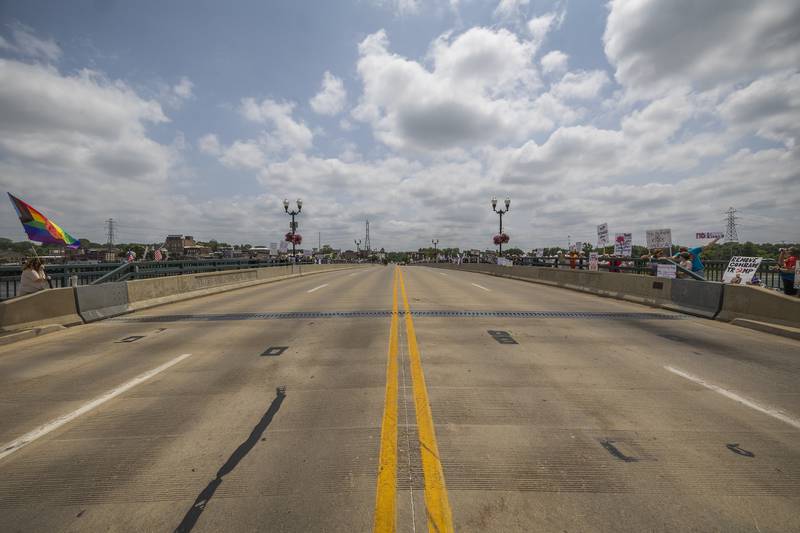 Protesters in Dixon join a nationwide No Kings protest Saturday, June 14, 2025. The anti-Trump gathering lined both sides of the Peoria Avenue Bridge.