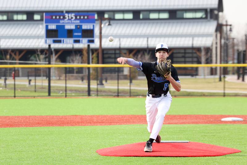 Peotone's Cole Peppers releases a pitch during their game against Kankakee on Friday, April 3, 2026.