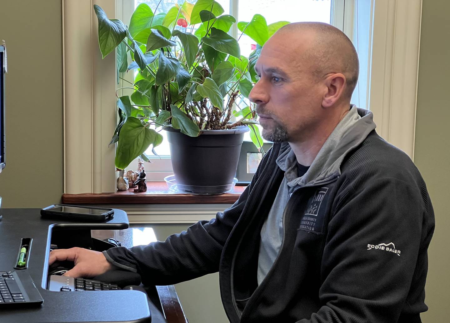 On May 1, 2023 Noah Nordbrock, with DeKalb County Community Foundation, works from his desk ahead of the 10th annual Give DeKalb County Fundraiser.
