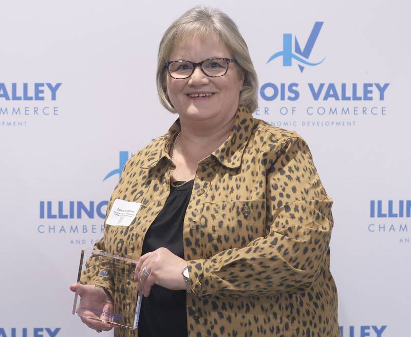 Donna Nordstrom poses with her Cornerstone award during the Illinois Valley Chamber of Champions of Change Awards Night on Wednesday, May 6, 2026 at the Westclox Event Center in Peru.