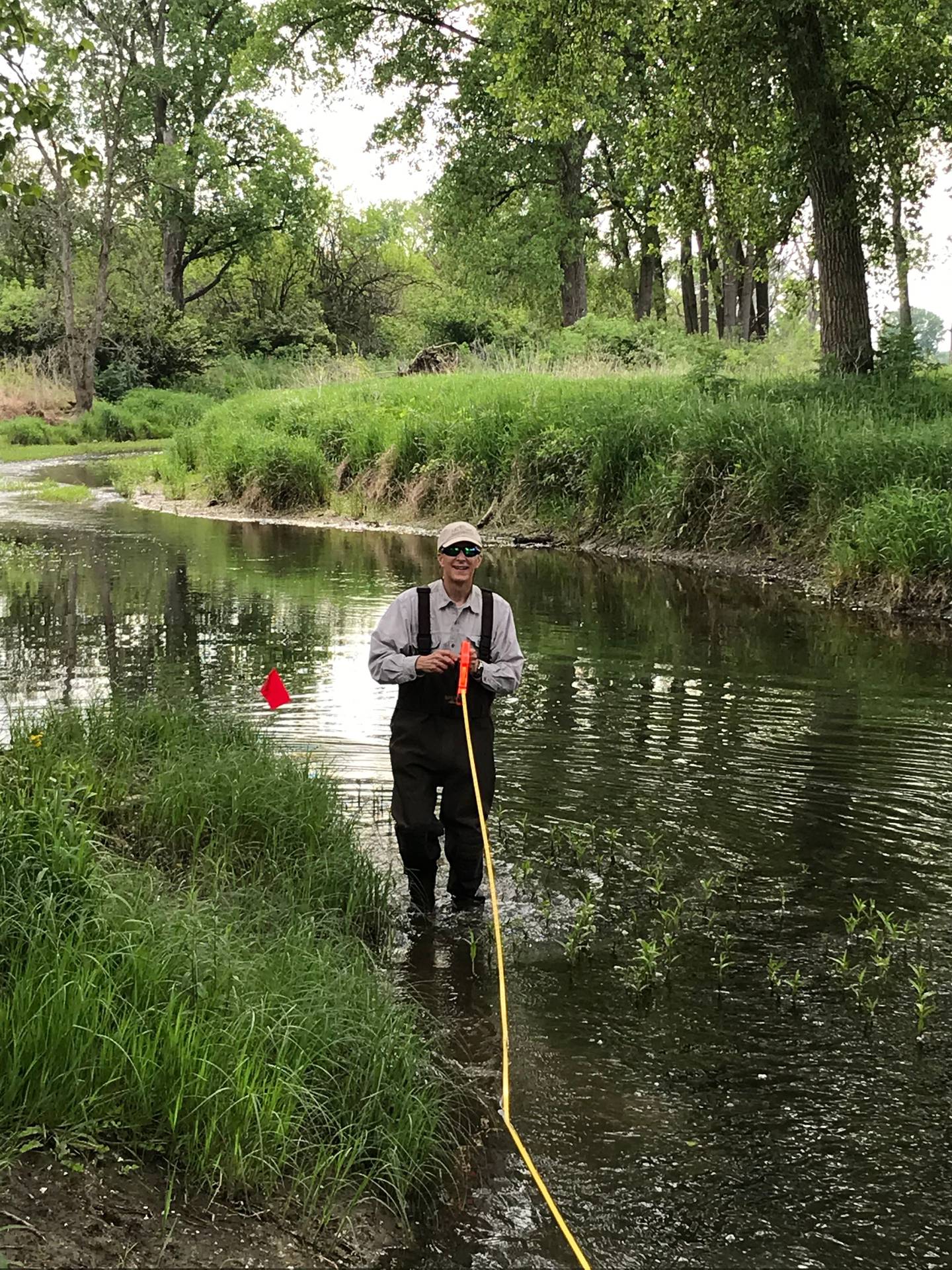 Plainfield resident Jim Pustz, a volunteer citizen scientist for Illinois RiverWatch, helps monitor stream at Midewin National Tallgrass Prairie in Wilmington. 
Pustz recently received the RiverWatch Lifetime Achievement Award.