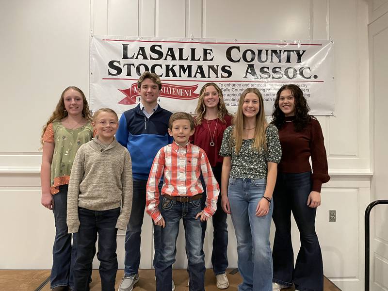 The 2022 La Salle County Fair Grand and Reserve Champion Market Animals owners are (front row) Conner Cave, Grand Reserve Champion Barrow; Garrett Billups, Grand Reserve Champion Barrow; Jessica Reel, Grand Champion Lamb; (back row) Mollie Thomson, Grand & Reserve Champion Goat; Tom Durdan, Grand and Reserve Champion Beef; Lauren McNelis, Grand Champion Dairy; and Karly Reel, Grand Champion Lamb.