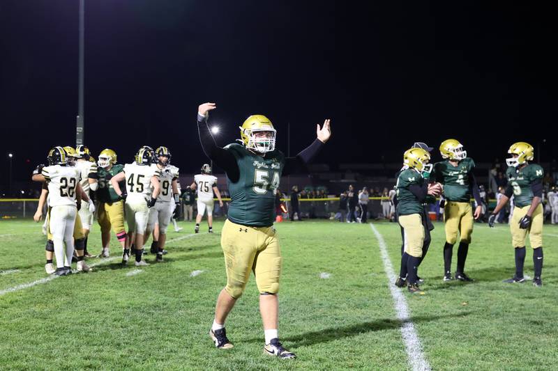 Bishop McNamara's Ian Irps celebrates as the clock runs out as the Fightin' Irish secured a 38-14 victory over Herscher in the IHSA Class 3A first round playoff game on Friday, Oct. 31, 2025.