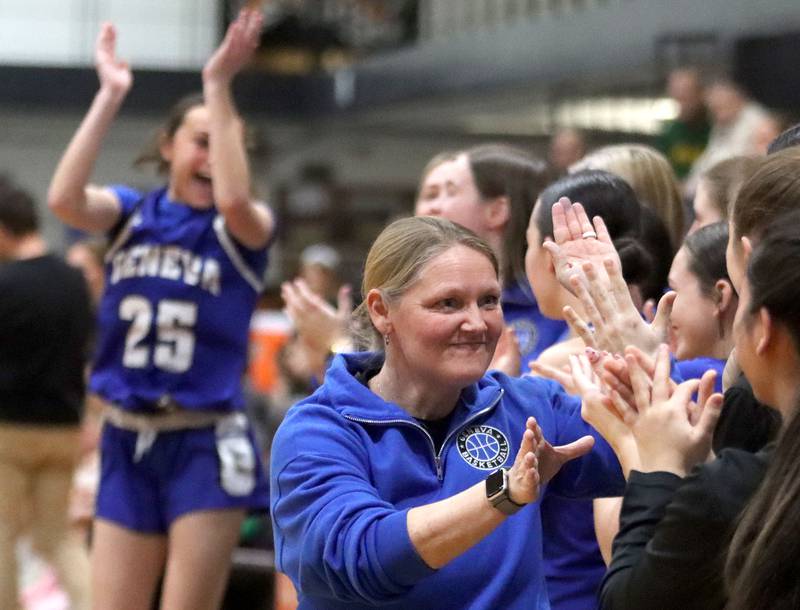 Geneva’s Head Coach Sarah Meadows and the Vikings celebrate a win against Crystal Lake South in girls IHSA Class 3A Sectional Championship basketball on Thursday, Feb. 26, 2026, at Crystal Lake Central High School in Crystal Lake.