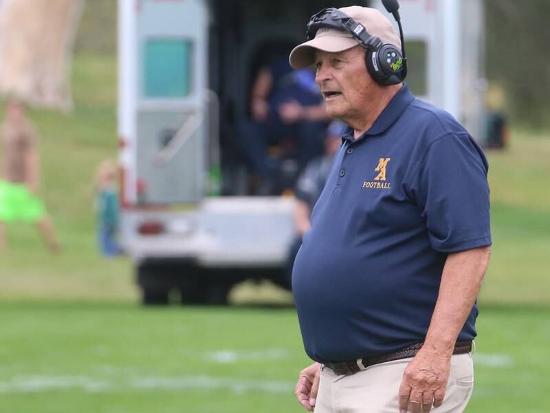 Marquette head football coach Tom Jobst coaches his team against St. Bede on Saturday, Sept. 28, 2024 at St. Bede Academy.