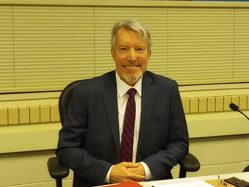 Michael McCormick at his last Geneva District 304 school board meeting after serving 12 years on the board.