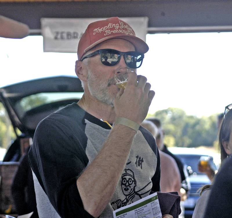 Jeff Kay of Dixon samples a craft beer.  The Craft Beer Festival and Halloween Town offered fun for all in downtown Sterling The events took place on Saturday, October 11th, 2025.