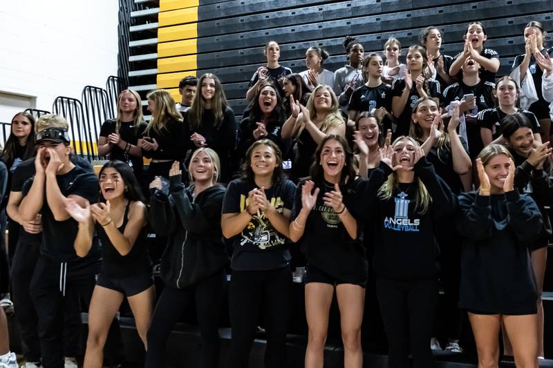 Joliet Catholic fans cheer on the varsity volleyball team during their away game against Joliet West on Sept. 4, 2025.
