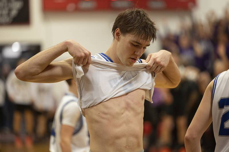 Newman’s Asher Ernst comes off the court after the Comets’ season ended in OT 70-66 to Pecatonica Tuesday, March 3, 2026, in the 1A sectional semifinal.