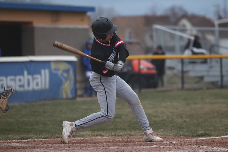 Bolingbrook’s Marvin Guzman connects for a 2 run triple against Joliet Central on Tuesday, March 21st. 2023.