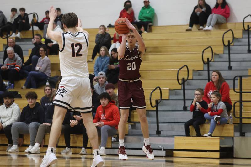 Lockport’s Anthony Kosi puts up the three point shot against Lincoln-Way Central on Tuesday, Jan. 23rd, 2024 in New Lenox.