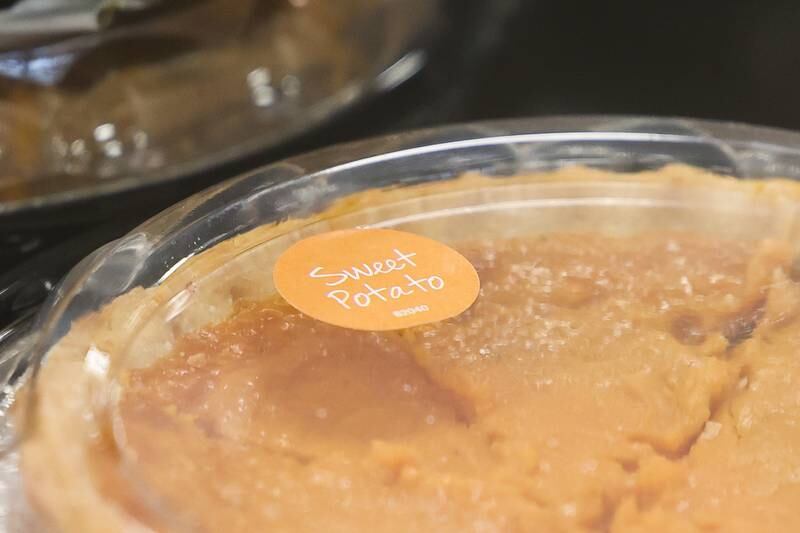 A pumpkin pie sits on a table at the Daybreak Center on Thursday. The faith based organization is expected to serve over 100 meals to members of the community on Thanksgiving Day in Joliet.