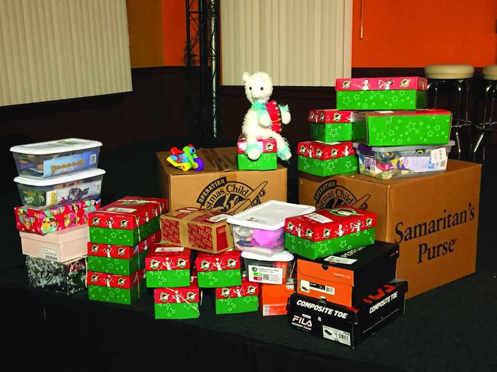 Bikers With Boxes Pack Shoeboxes Full Of Christmas Gifts For Needy 