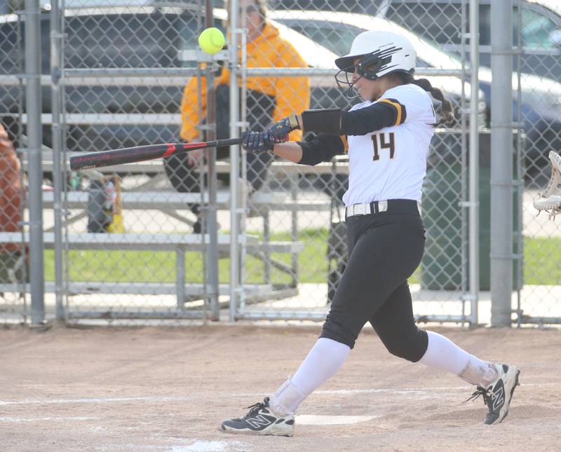 Marquette's Makayla Backos gets a hit against Putnam County on Tuesday, April 29, 2025 in Ottawa.