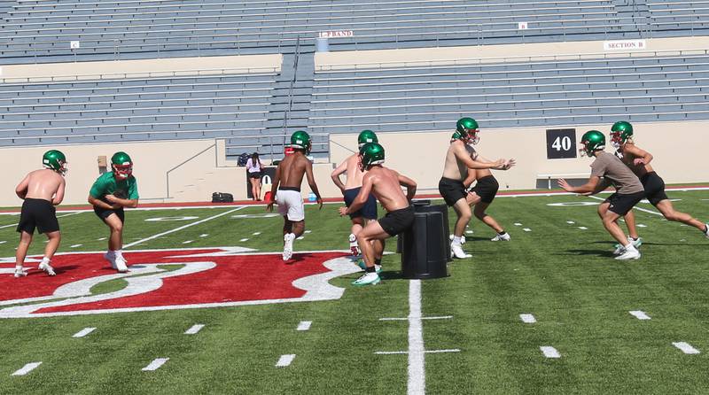 Members of the L-P Cavaliers football team run drills during the first day of football practice on Monday, Aug. 11, 2025 at Howard Fellows Stadium.