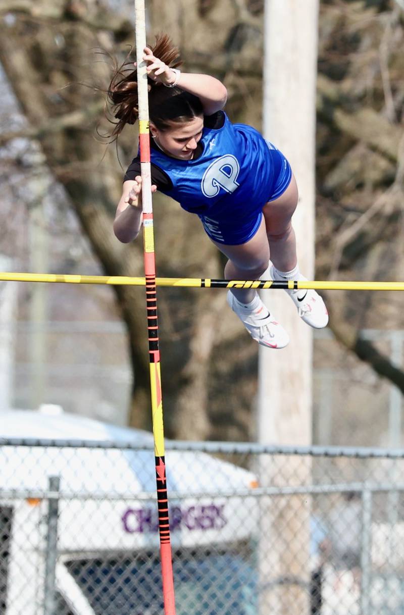Princeton's Annie Thompson clears the pole vault in Thursday's Howard-Monier Invite. She finished second.