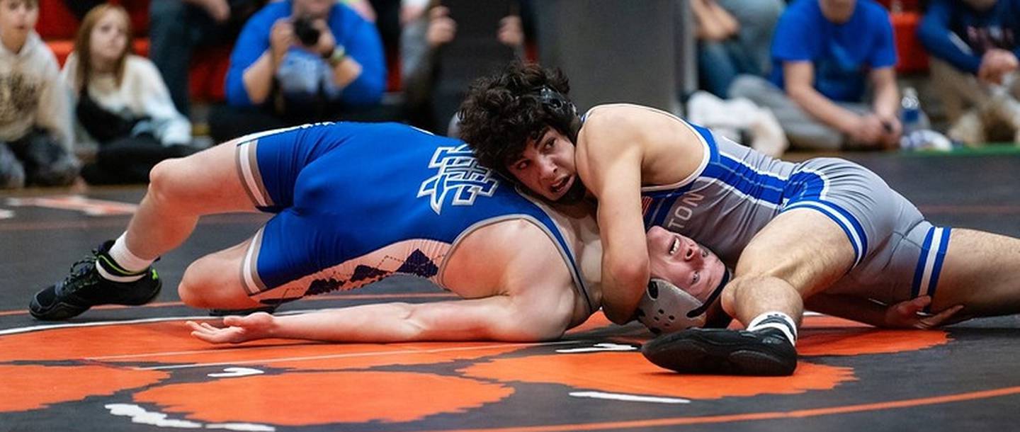 Princeton's Ace Christiansen works toward a pin in Saturday's Byron Sectional. He punched his ticket back to state with a runner-up finish.
